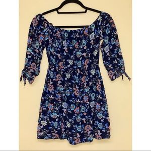 A beautiful navy blue dress with flower designs
